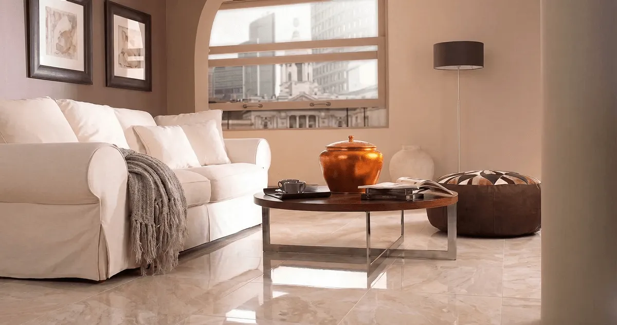 Modern living room with professionally installed marble flooring, a beige sofa, coffee table in Clearwater, FL